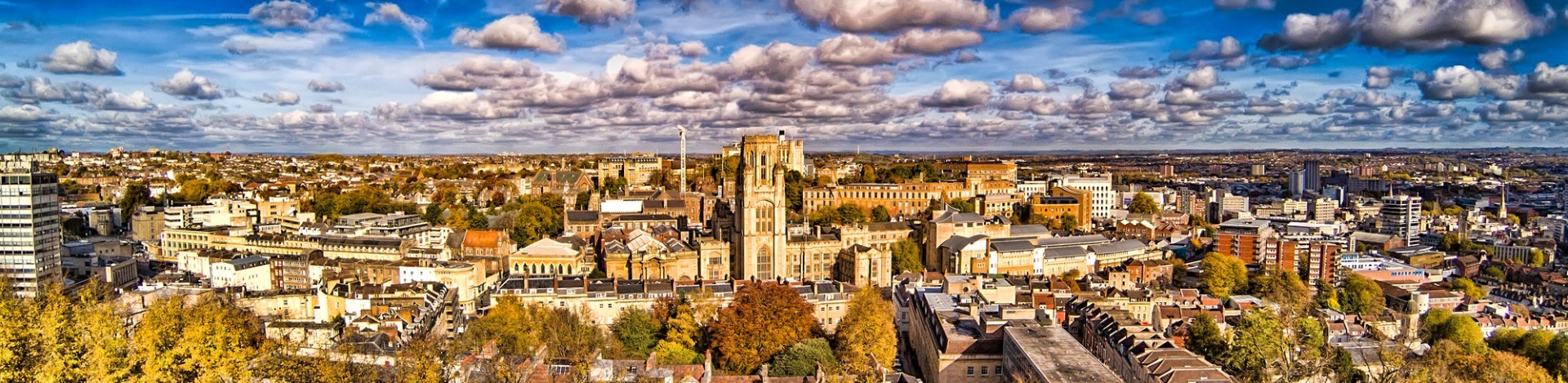 Panoramic view of Bristol with a focus on the Wills Memorial Building at the top of Park Street.